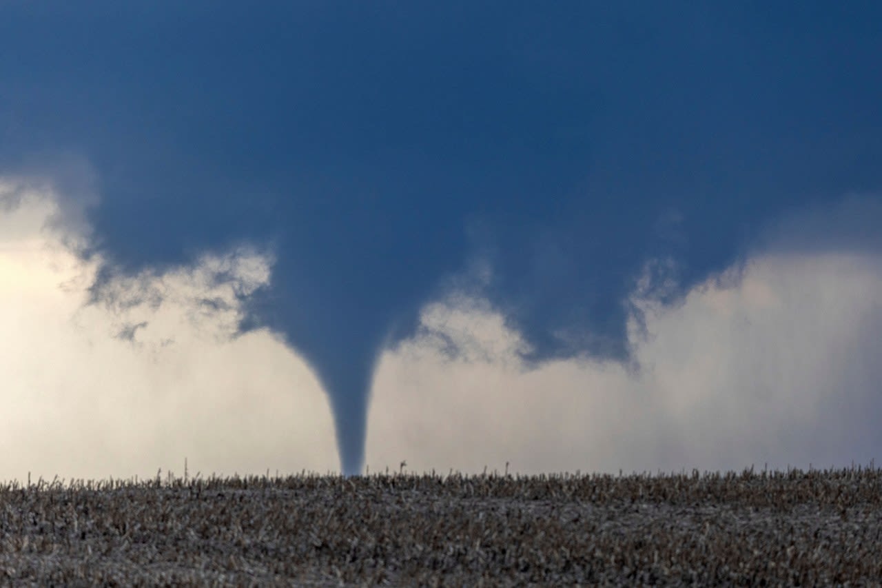 Residents begin going through the rubble after tornadoes hammer parts of Nebraska and Iowa