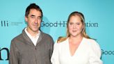 Amy Schumer and Husband Chris Fischer Hold Hands During Red Carpet Date Night in NYC