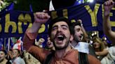 Photos: Georgians ‘March for Europe’ in protest against controversial bill