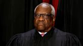 New documents show unreported trips by Justice Clarence Thomas