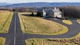 A Connecticut home with a private FAA-approved airstrip and hangar has hit the market for $2.9 million. Take a look.