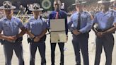 Younger brother of fallen GSP Trooper receives his Georgia Gwinnett College degree on his behalf