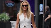 Amanda Holden cuts a stylish figure in a white top and trouser co-ord