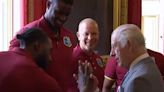 King Charles Learns New Handshake as he Welcomes West Indies' Squad to Buckingham Palace - WATCH - News18