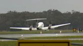 Plane makes successful wheels-up emergency landing in Australia after circling airport for hours