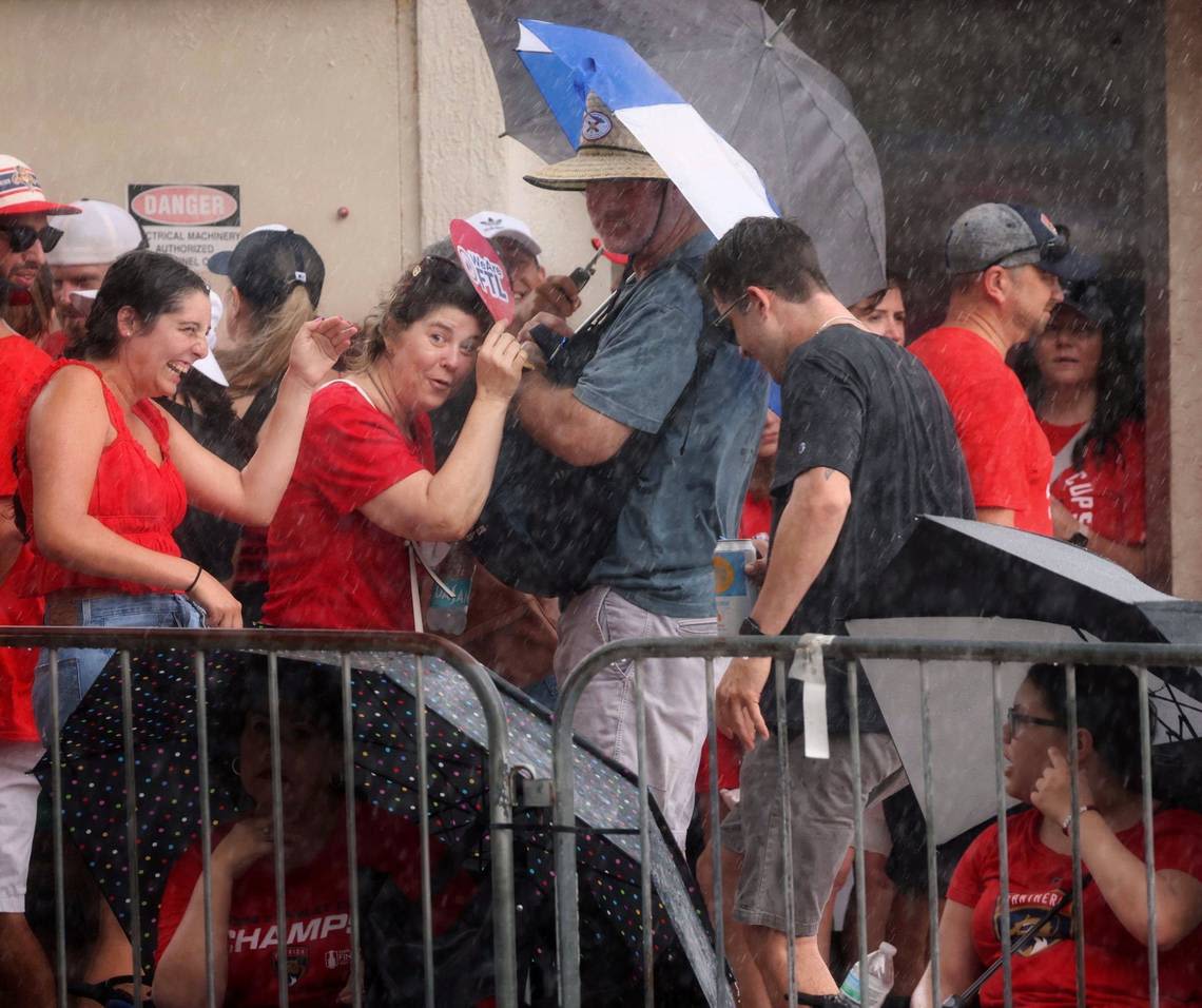 Panthers fans get drenched as they await Stanley Cup beach celebration. See the scenes