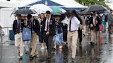 Heavy rain showers drench the UK with THUNDER rumbling in