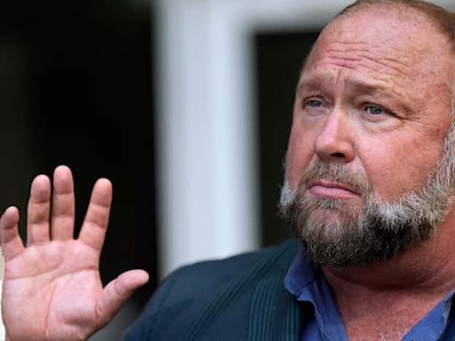 Judge stops parents’ effort to collect $50M Alex Jones owes for Newtown shooting claims