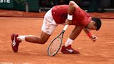 Djokovic shrugs off injury, pips Cerundolo in another French Open epic