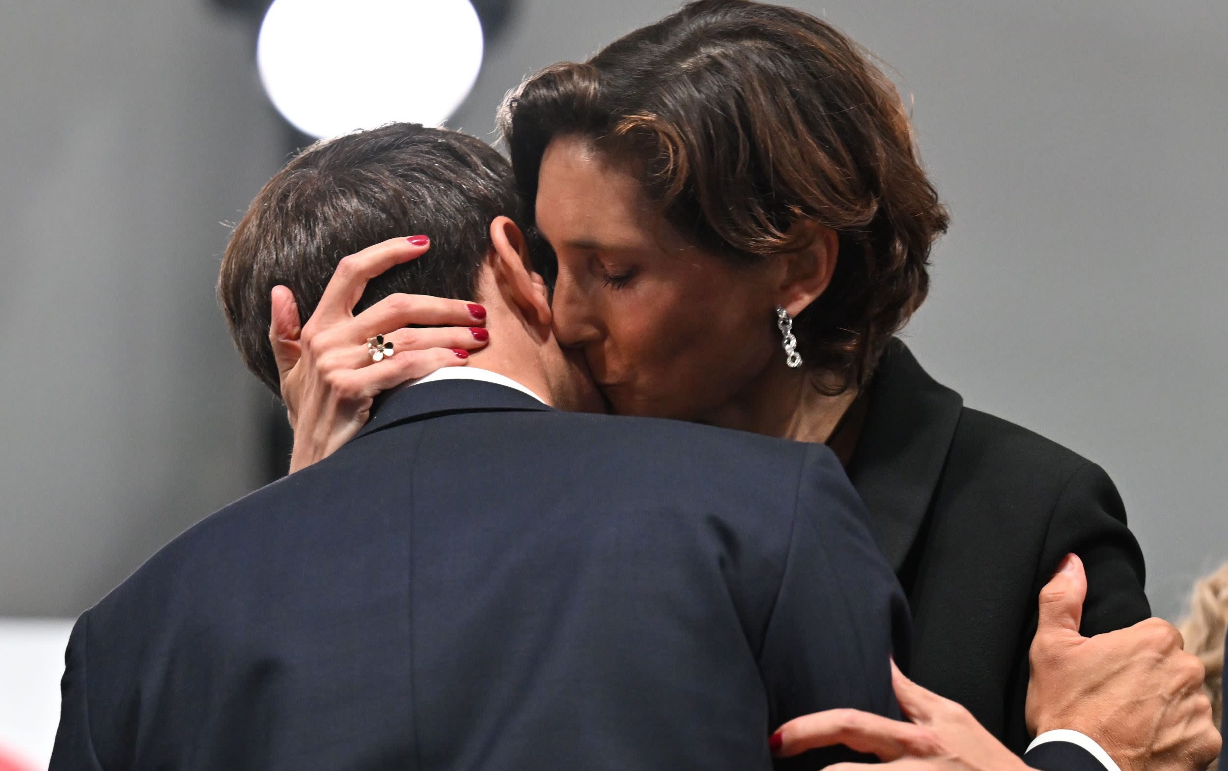 Pictured: ‘Curious kiss’ between Macron and French sports minister