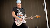 Watch Tom DeLonge Fall To His Knees, Rush Offstage To Vomit Mid-Show | iHeart