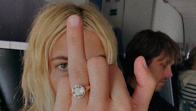 Emma Roberts flashes her large diamond engagement ring