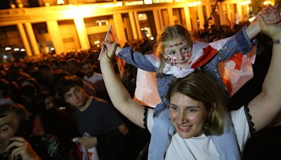 Georgia fans greet returning players with rally after 'miracle' Euros