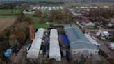 Migrant staying at Manston processing centre dies in hospital