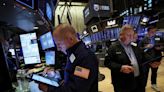 Wall Street rallies to end higher on Alphabet, Netflix lift