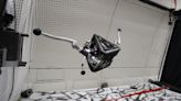 Watch a tripod robot test its asteroid leaping skills