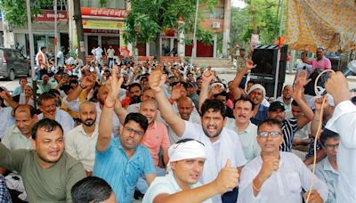 Karnal: Outsourced staff shift dharna site