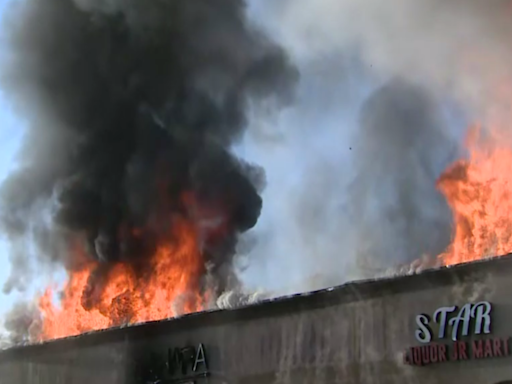 Flames tear through strip mall in Anaheim, burning multiple businesses