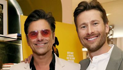 John Stamos Nearly Bares It All in Racy Photo With Glen Powell: 'Have Mercy!'