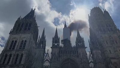 Fire breaks out in the spire of medieval cathedral in French city of Rouen