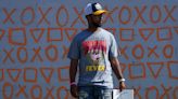 Indy street artist Kwazar starts work on Colts quarterback Anthony Richardson mural