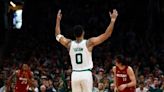 Jayson Tatum triple-double, 3s lead Celtics past Butler-less Heat 114-94 in playoff opener