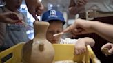 Boy who smashed ancient Bronze Age jar returned to museum – and saw the ill-fated jar get repaired