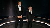 Twins stars and Batman villains Schwarzenegger and DeVito reunite at Oscars