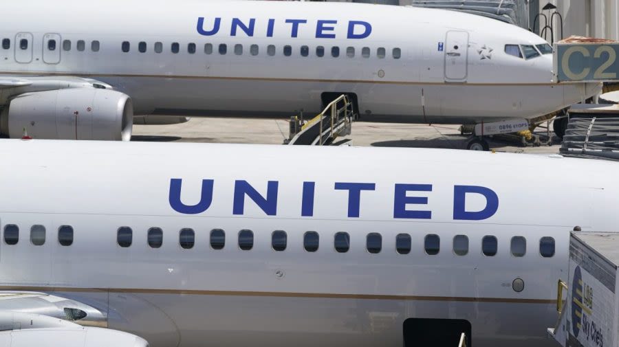 United jet engine catches fire on runway