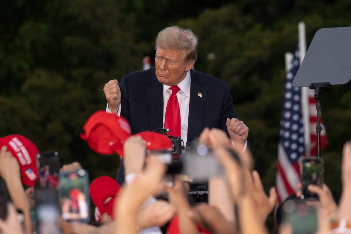 Trump spouts xenophobic conspiracy at Bronx rally that China is building migrant sleeper cell army: Live