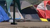 Encampment on sidewalk between South Lake Union and Seattle Center continues to grow