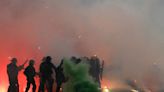 Fans swarm pitch, throw flares at players after loss leads to relegation in French soccer league