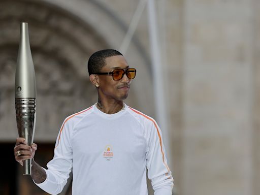 Pharrell Williams Carries Torch at Paris 2024 Olympics