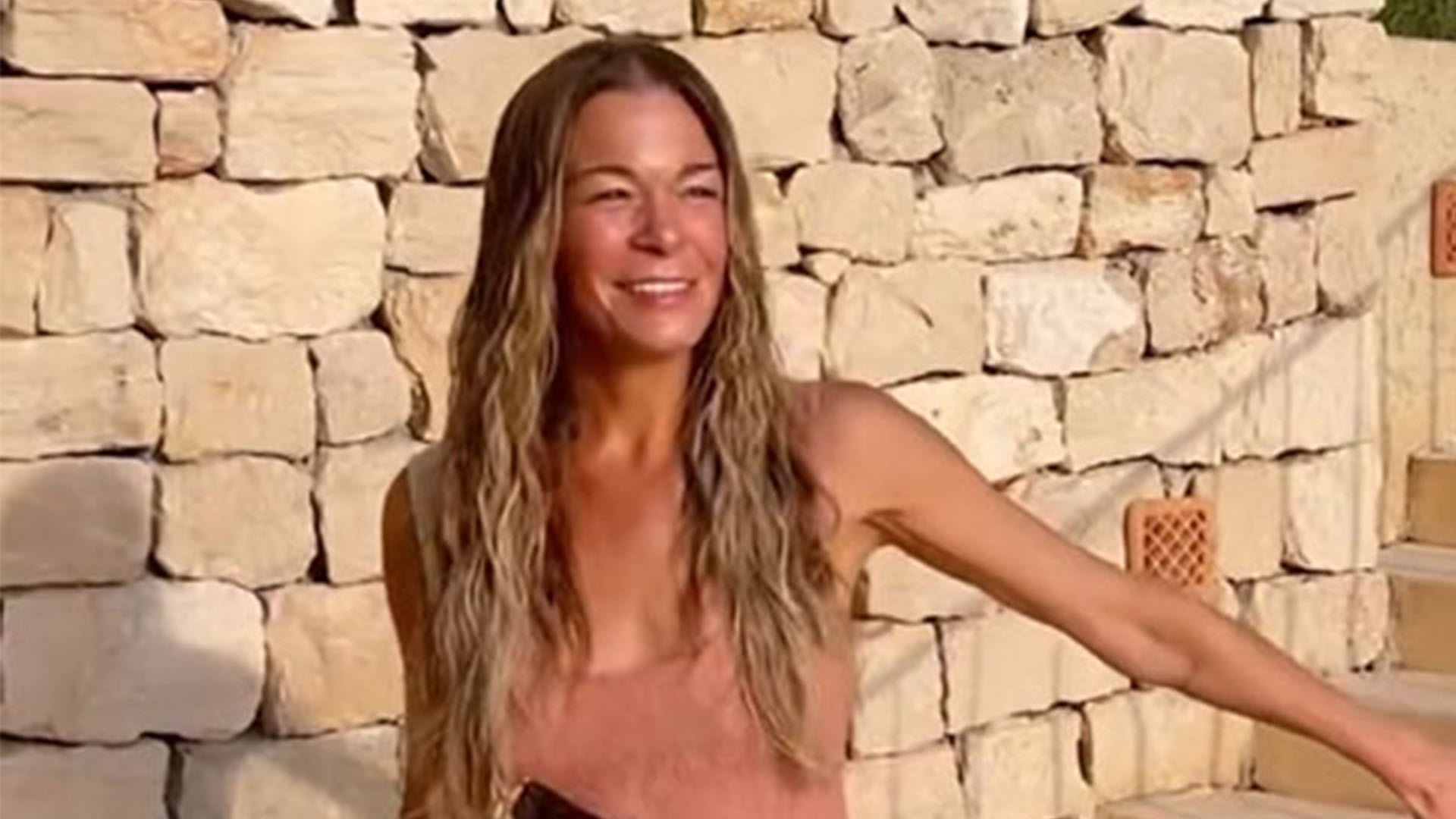 LeAnn Rimes lounges in tiny bikini in rare videos with husband Eddie Cibrian