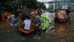 Streets turned into rivers as Typhoon Gaemi hits Philippines | FOX 28 Spokane