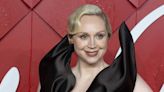 Gwendoline Christie looks unrecognizable as a life-size porcelain doll at Paris Fashion Week