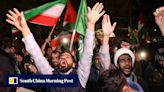 ‘God’s victory is near’: Iranians celebrate in streets following attack on Israel