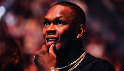 UFC star Israel Adesanya appears to spit on man during road rage incident: ‘I dare you to try me’