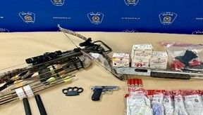 Sawed-off shotgun, ammunition, suspected fentanyl seized