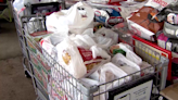 28/22 News fills 18 shopping carts in fight against hunger