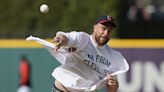 Travis Kelce spikes first pitch before Seattle-Cleveland game at Progressive Field