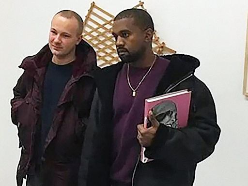 Kanye jets into Moscow and is mobbed by fans during surprise visit