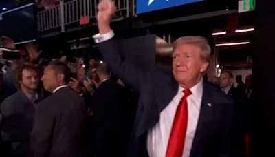 Split screen: Trump triumphant at RNC convention as Biden battles for his political life