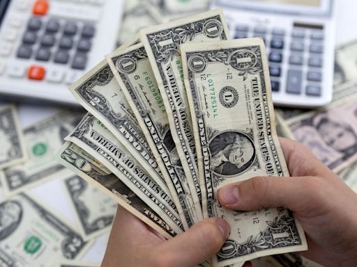 Dollar adrift ahead of US inflation test; sterling firms