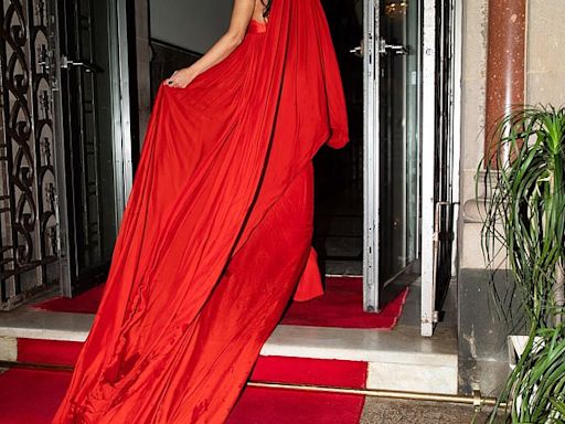 Kim Kardashian channels Princess Jasmine in a sweeping red gown