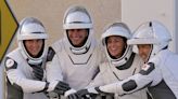 Latest four-member SpaceX crew, including cosmonaut, welcomed aboard space station