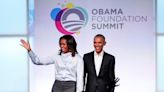 Barack and Michelle Obama return to the White House for portrait unveilings