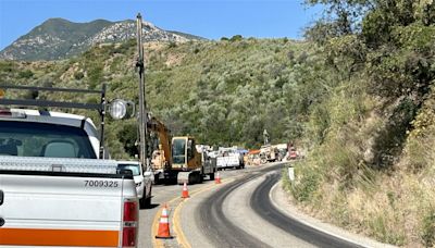 Crews working overtime to open a lane along 154 in time for Fourth of July travelers