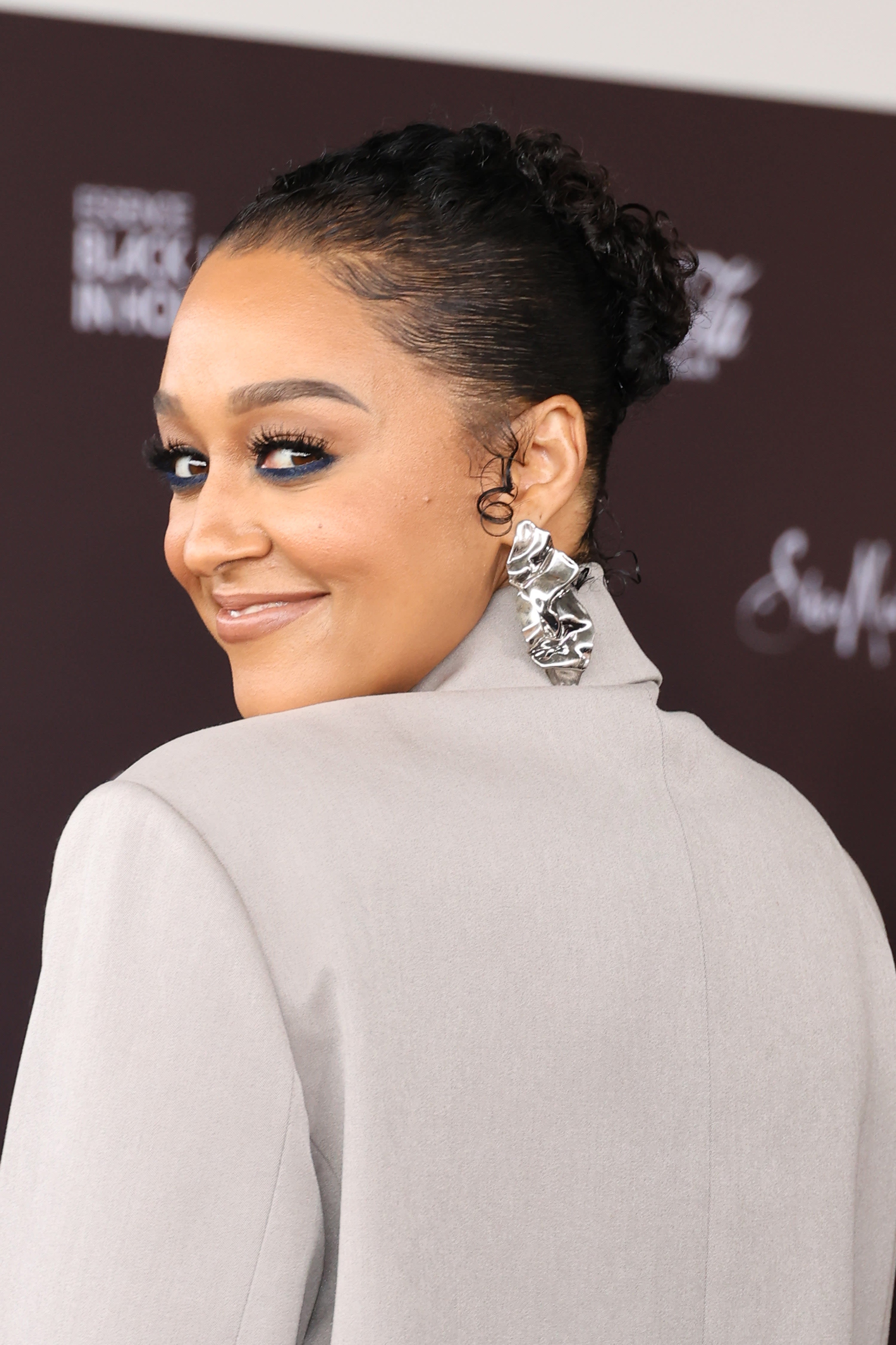 It's Not Every Day You See Knee-Length Twists Like Tia Mowry's