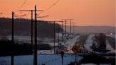 Minnesota takes rare step to allow power lines alongside highways